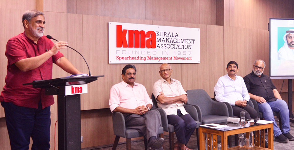 economic reforms,FACT contributions,global unrest,international relations,investment opportunities.,investor-friendly initiatives,Kerala industries,Kerala investments,Kerala Management Association,MKK Nair Memorial Lecture,The New World Disorder,Venu Rajamony,visionary leadership